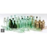 A collection of six Codd bottle variants, also flat bottom cylinder and mineral water bottles,