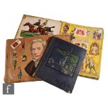 Three late 19th to early 20th Century scrap books containing various cuttings, decoupage scraps