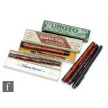 A Maurice Jaffa red and gold coloured marble effect fountain pen and propelling pencil, an Onoto