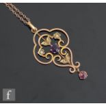 Ab early 20th Century 9ct amethyst and seed pearl set open work pendant, length 4.5cm, suspended