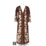 A 1930s ladies vintage evening or boudoir coat in brown silk with panels of embroidered hydrangea