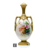 An early 20th Century Royal Worcester shape 2194 twin handled vase and cover panel decorated by Cole