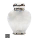 An Arts & Crafts silver plated ginger jar and cover of plain baluster form, height 17cm, stamped