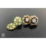 A pair of sapphire and diamond cluster stud earrings, with a similar emerald and diamond pair,