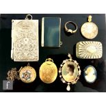 A small parcel lot of early 20th Century items to include two 9ct open lockets, weight 23g, a