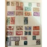 A 1930s green Triumph Stamp Album for postage stamps of the world, ninth edition.