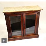 A William IV rosewood marble top display cabinet, the interior enclosed by a pair of glazed doors,