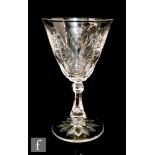 A late 19th Century Stevens & Williams rock crystal style drinking glass, the round funnel bowl