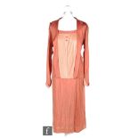 A 1920s/30s ladies vintage dress in dark salmon jersey, with blush pleated dummy front panel,