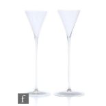 A pair of 17th Century Netherlands Façon de Venise toasting glasses, known as pijpesteel or 'pipe-