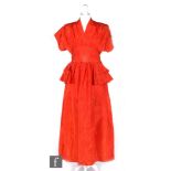 A 1950s ladies vintage evening dress in red satin with V neck, cap sleeves, the empire waistline