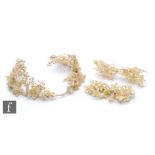 A 1920s/30s wax floral bridal headdress, the ivory coloured wax flowers with further beading,