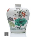 A Chinese porcelain enamelled vase, the white glazed body enamelled in green and iron-red and