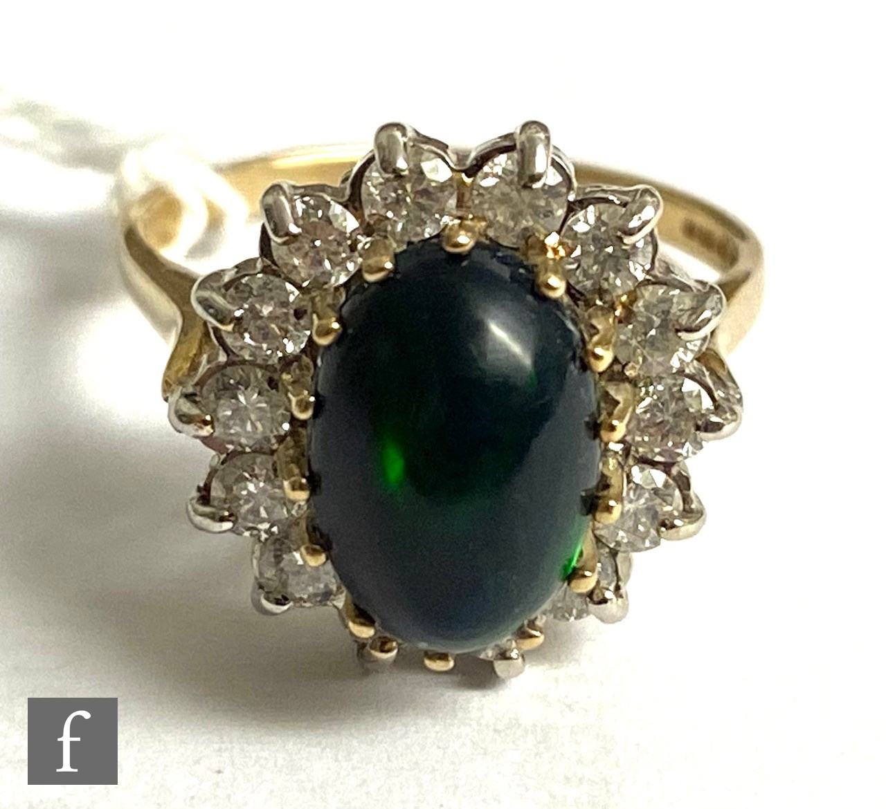 A 9ct hallmarked black opal and diamond cluster ring, central oval opal, length 11mm, within a - Image 3 of 7