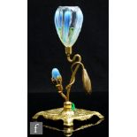 An early 20th Century John Walsh Walsh glass Water Lily epergne, the square gilt metal base with