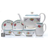 A Spode Trapnell Sprays pattern tea for two comprising teapot, milk jug, sugar bowl and two cups and