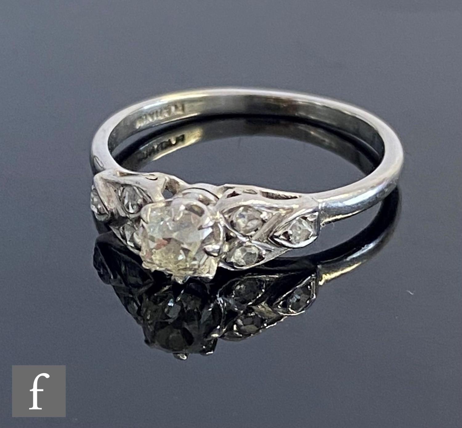 An early 20th Century platinum diamond solitaire ring, old cut claw set stone, weight