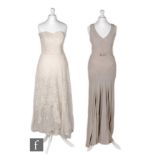 A 1930s ladies full length sleeveless bias cut evening dress in a mauve crepe with diamond panels,