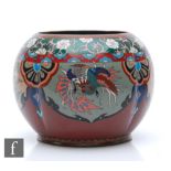 A Japanese cloisonne bowl of lobed form, the exterior sides decorated with flowers and phoenix,
