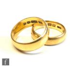 Two 22ct hallmarked D shaped wedding rings of plain form, total weight 13g, one dated Birmingham