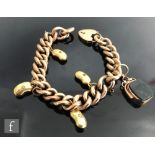 A 9ct rose gold curb link bracelet with chased decoration to alternate links and four 18ct bean