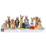 Nine assorted boxed Royal Doulton Bunnykins figurines comprising Choir Singer Bunnykins DB223, Bride