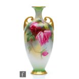 An early 20th Century Royal Worcester shape H287 vase decorated with crimson and pink roses, green