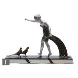 An early 20th Century Art Deco spelter study, depicting a silvered and gilt decorated female