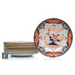 Eleven 19th Century Davenport 10 inch Chinoiserie dinner plates decorated in the Imari palette