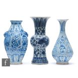 A collection of Chinese blue and white vases, to include a Gu vase with phoenix, height 31cm, a
