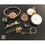 A small parcel lot of assorted jewellery and other items to include rings, two fob watches, a 9ct