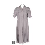 A 1940s ladies vintage dress in grey heavy crepe, with panels of diagonal ribbed details, collar and