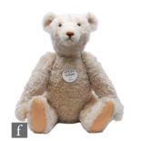 A Steiff Teddy Bear 1921 replica bear, white tag 407291, white mohair, retains chest tag, limited