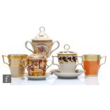 Five assorted 19th Century chocolate cups to include a Barr Flight & Barr twin handled cup with a