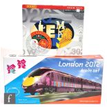 Two OO gauge Hornby train sets, R2579A DCC ready BR Class 101 3-car DMU, and R1153 London 2012 train