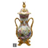 A large 19th Century pot pourri vase and cover profusely decorated with hand painted flowers and