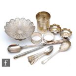 A small parcel lot of assorted hallmarked silver and white metal items to include a silver pen, a