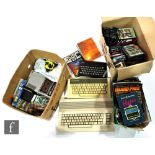 A collection of assorted retro gaming items, to include an Acorn Electron, a Commodore 64, and a