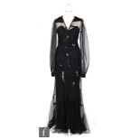 A 1920s vintage ladies full length evening dress, the black silk strapless underdress with a black