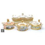 Four assorted 19th Century inkwells of varying form to include a Barr Flight and Barr example with a