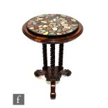 A mid 19th Century Italian specimen marble pietra dura table top of circular form, raised on a
