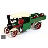 A Mamod SW1 Steam Wagon in green and cream, unboxed.
