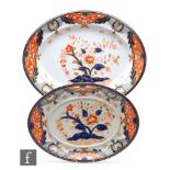 A large 19th Century Davenport Chinoiserie meat plate decorated in the Imari palette with a stylised