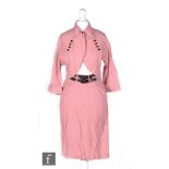 A 1950s/1960s ladies vintage two piece suit in a pink satin with a thin brown stripe, the bolero