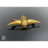 A 9ct hallmarked RAF wings brooch, weight 3.3g, length 4cm, highlighted with green and red enamel