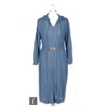 A 1930s/40s ladies vintage dress in blue crepe, the bodice with pierced detailing, ruffled neck