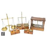 A set of late 19th and early 20th Century brass pharmaceutical balance scales stamped Legrave & Co