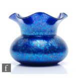 Loetz - An early 20th century Cobalt Papillon glass vase, of squat ovoid form with flared frilled