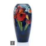 William Moorcroft - A large Frilled Orchard pattern vase decorated with a band of flowers against