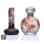 Galle - An early 20th Century cameo glass scent bottle, of ovoid form, cased in amethyst over the